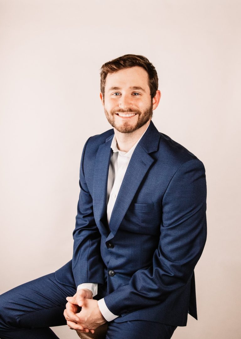 A man posing for a photo